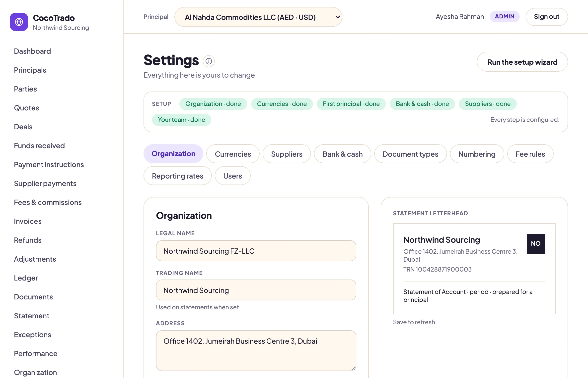Organization settings: the setup steps all done, the organization form, and a statement letterhead preview beside it