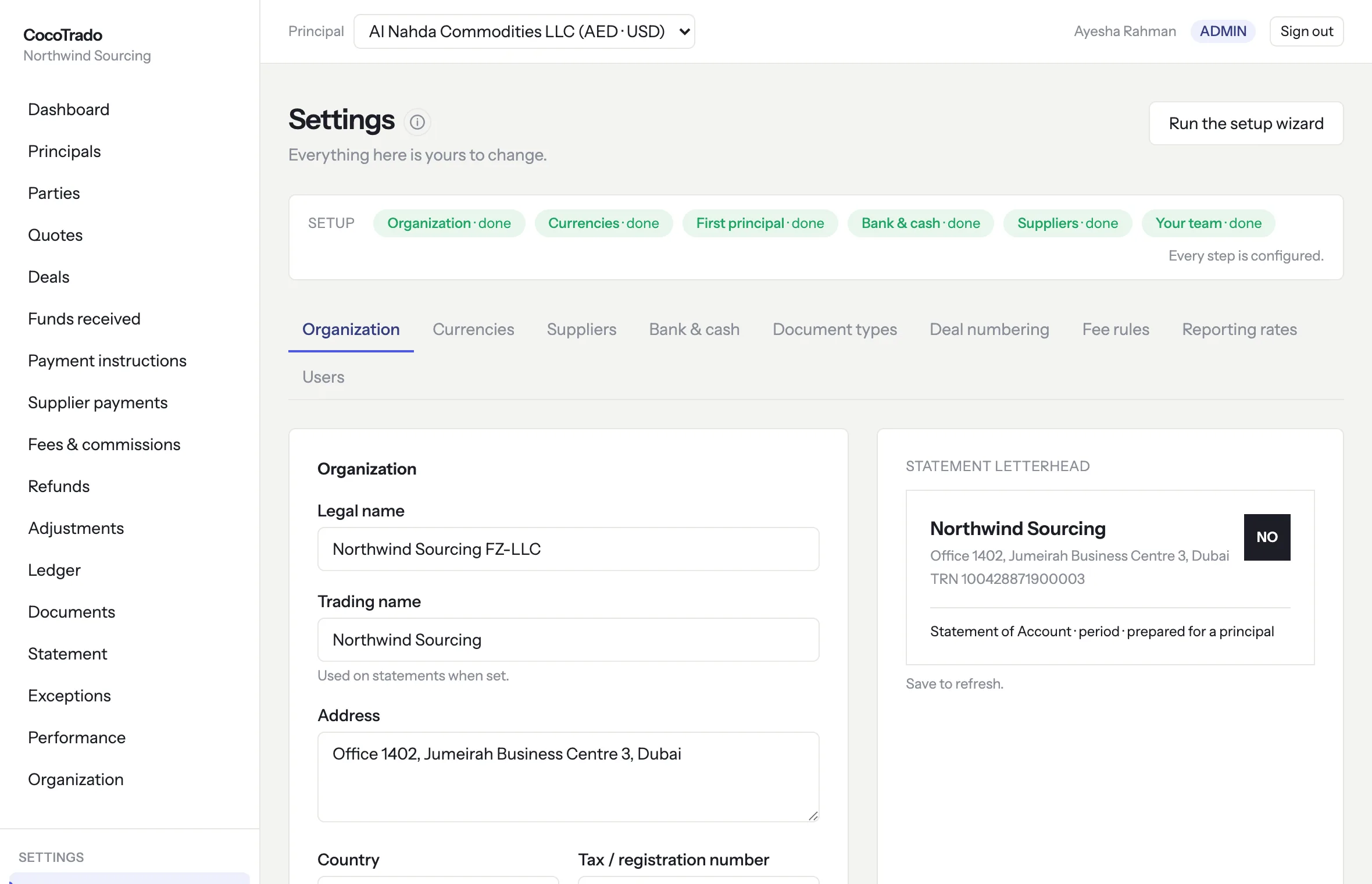 Organization settings: the setup steps all done, the organization form, and a statement letterhead preview beside it